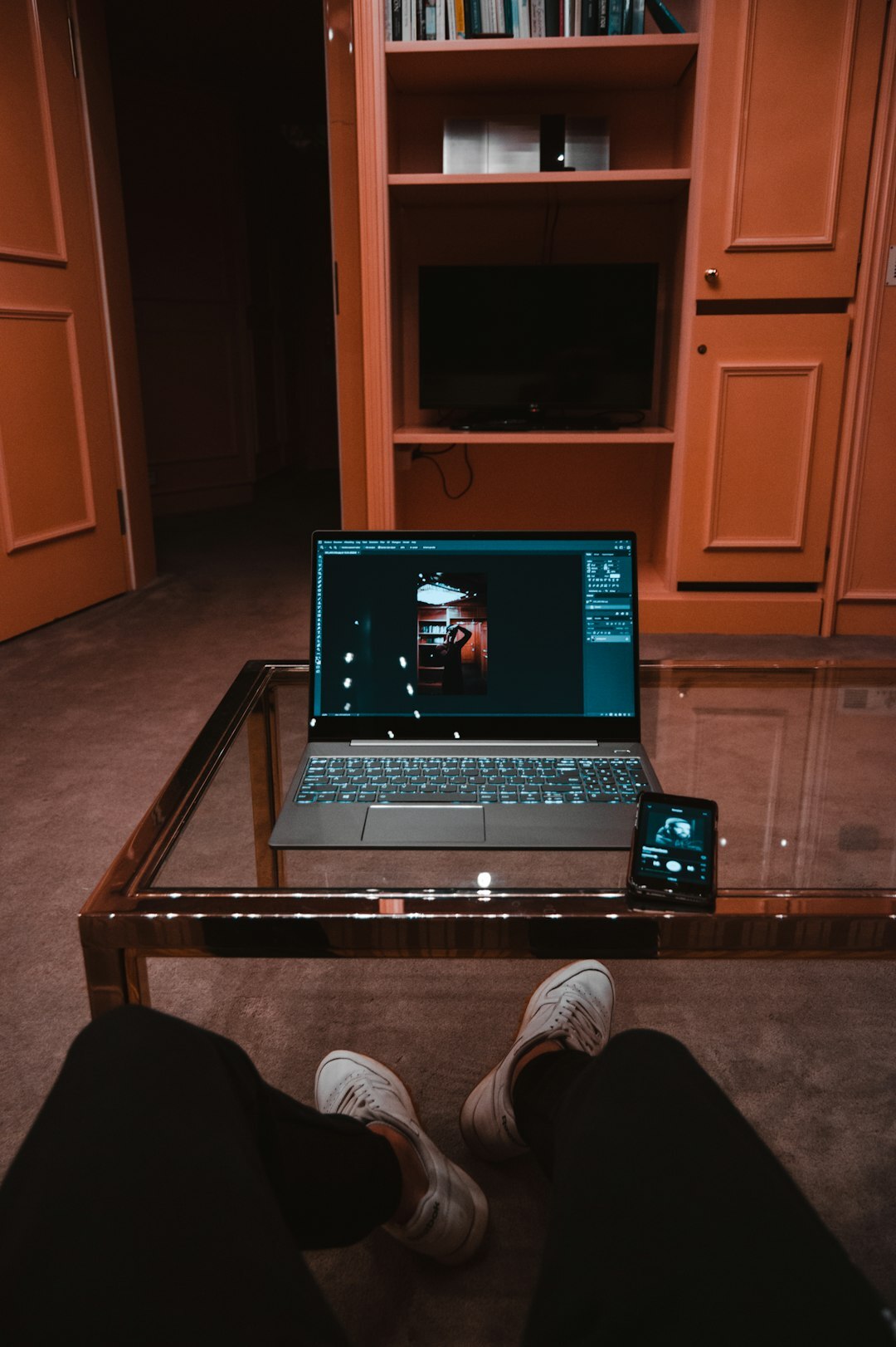 person watching movie on laptop