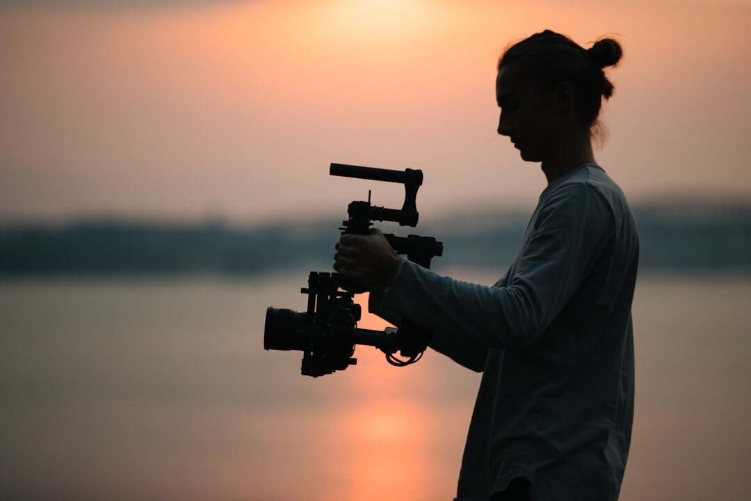 professional filmmaker with camera